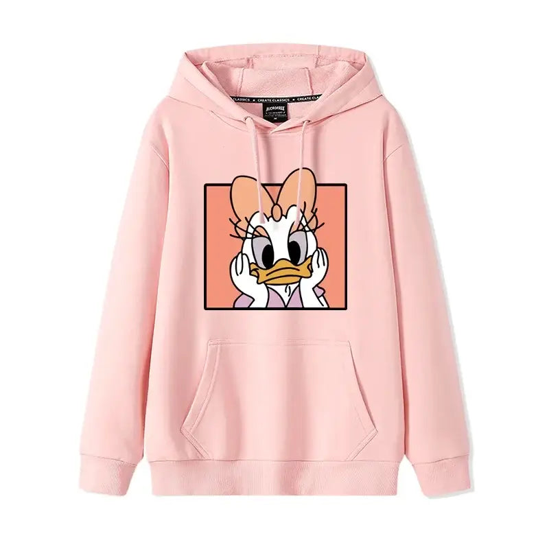 Sweatshirt disney donald rose avec graphique cartoon de daisy duck les mains sur les joues encadrée en noir sur fond orange