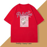 T-shirt coton love palestine rouge avec imprimé graphique love you more et texte palestine en script pailleté