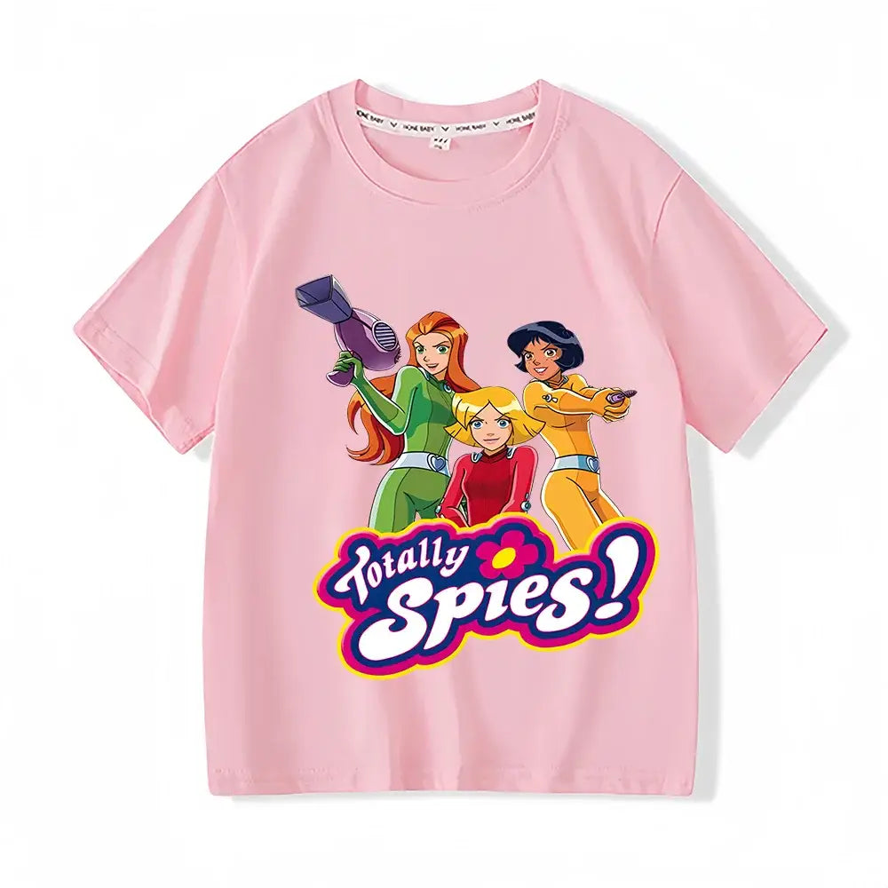 T-shirt enfant totally spies rose avec graphisme coloré des personnages de missions secrètes totalement spies