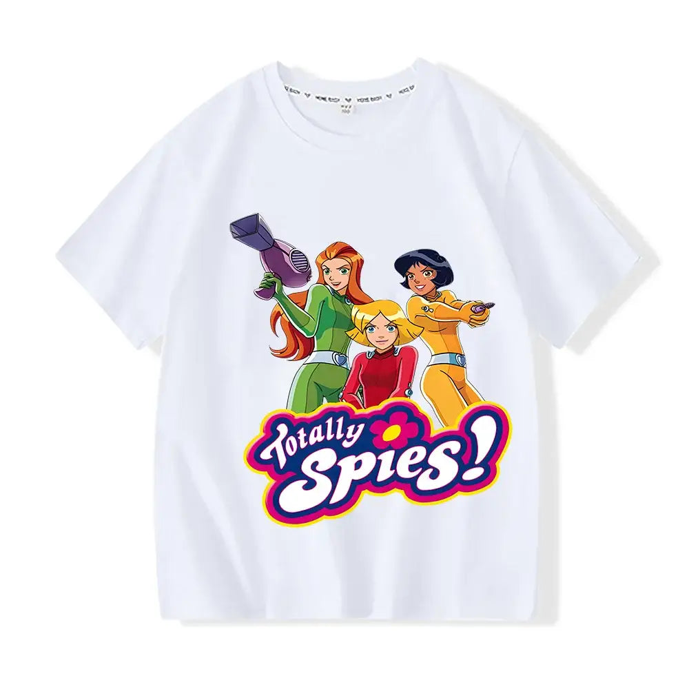 T-shirt enfant totally spies blanc en coton avec graphique coloré des personnages en tenues de missions secrètes