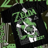 T-shirt noir legend de zelda avec un graphique vert vif de link, boutons rétro gaming pixelisés et symbole triforce