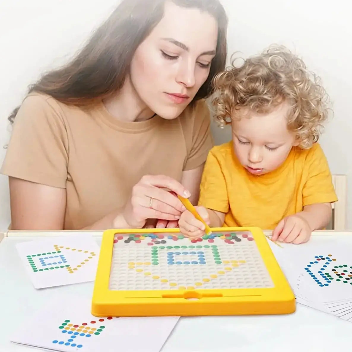 Magnetic drawing board with pen and beads