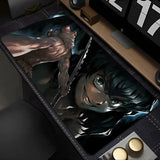 Tapis souris xxl demon slayer inosuke noir avec illustration détaillée du personnage musclé aux yeux verts et épée