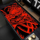Tapis souris xxl demon slayer inosuke featuring a black and vibrant red stylized dragon graphic design