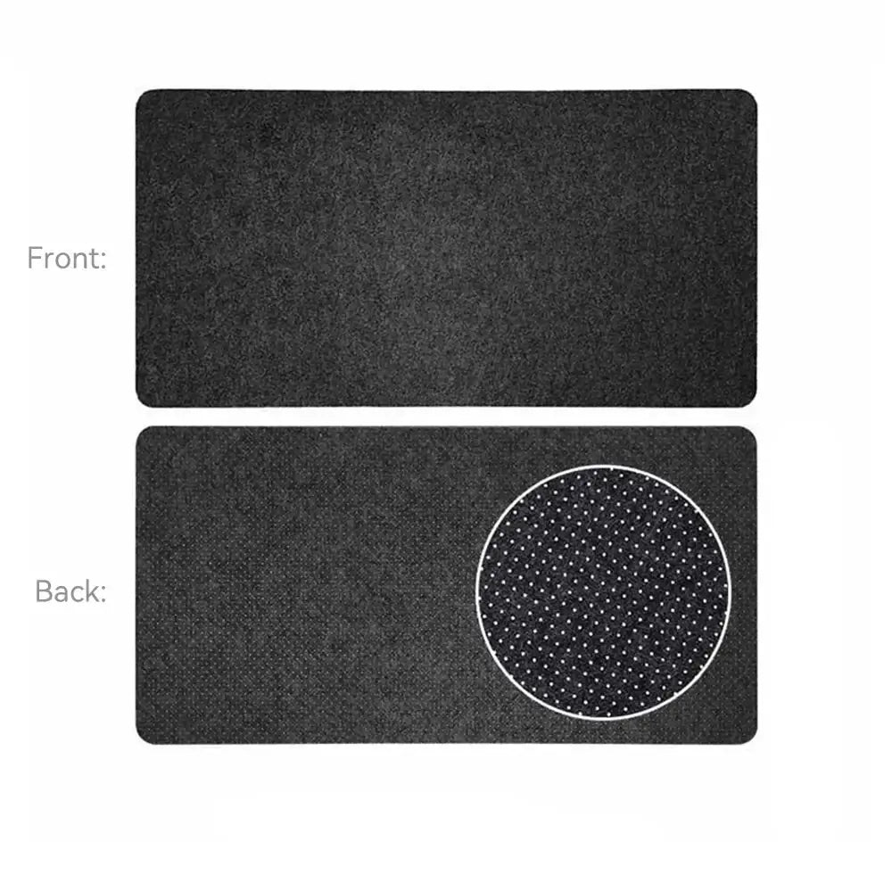 Dos du tapis souris xxl en feutre de laine noir avec surface douce à points blancs pour confort optimal