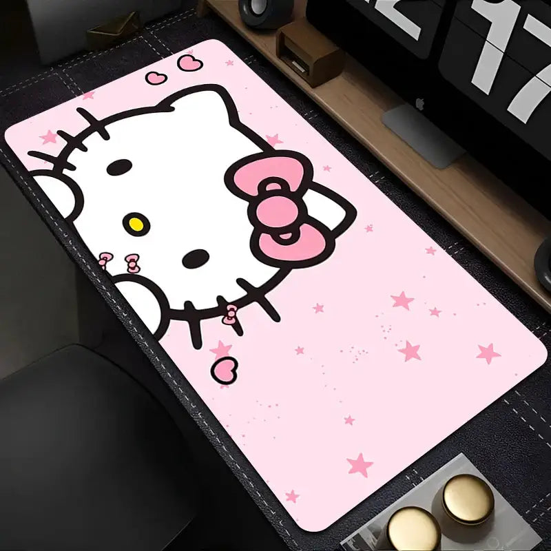 Tapis souris xxl hello kitty en rose avec design adorable cousu, nœud et motifs étoilés sur surface lisse