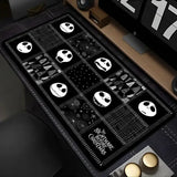 Tapis souris xxl noir avec illustrations blanches de jack skellington film culte et motifs géométriques