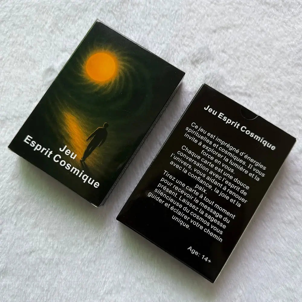 Boîte noire rectangulaire cartes tarots français esprit cosmique avec dessin silhouette soleil orange et énergie spirituelle