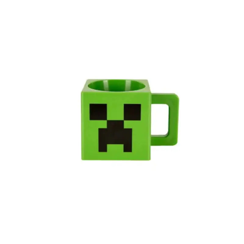 Tasse mug minecraft vert avec visage pixélisé noir inspiré du jeu emblématique minecraft 3d