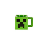 Tasse mug minecraft vert avec visage pixélisé noir inspiré du jeu emblématique minecraft 3d