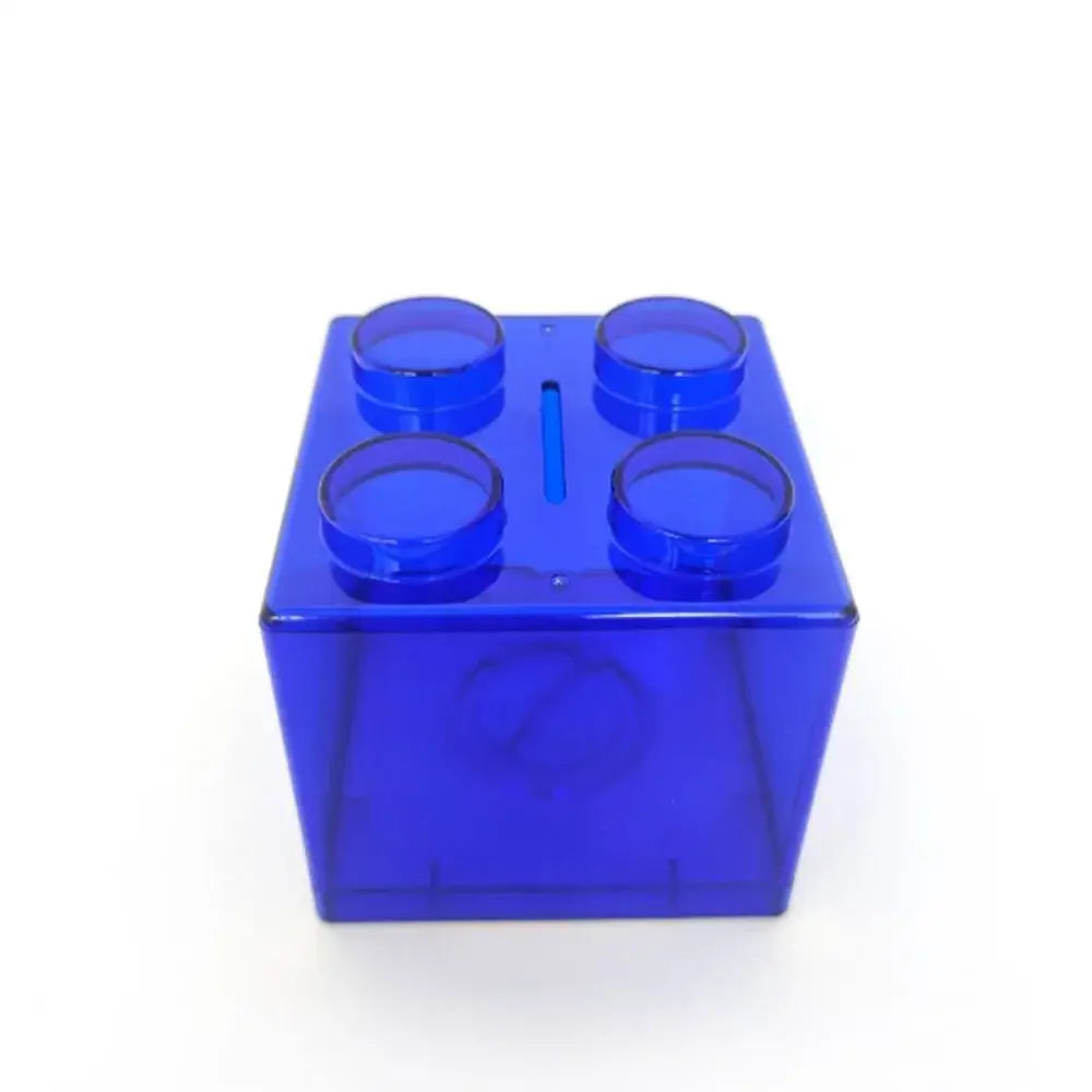Tirelire lego unique en plastique bleu transparent en forme de brique lego avec slot pour pièces hommage aux célèbres briques lego