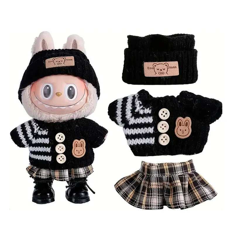 Pull tricoté noir en velours côtelé avec rayures blanches, patch lapin, et trois boutons crème, bonnet assorti idéal pour déguisement carnaval